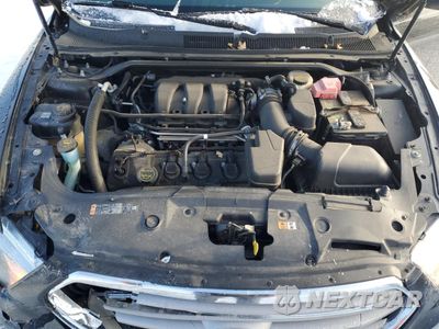 Zdjęcie 13 z 14 samochodu: 2015 FORD TAURUS SEL VIN:1FAHP2E88FG181069 - miniatura