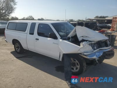 Czwarte zdjęcie samochodu z boku: 1999 NISSAN FRONTIER KING CAB XE VIN:1N6DD26S7XC306466 - miniatura