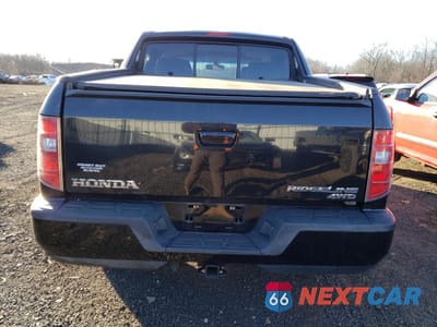 Zdjęcie 6 z 12 samochodu: 2011 HONDA RIDGELINE RTL VIN:5FPYK1F53BB008370 - miniatura