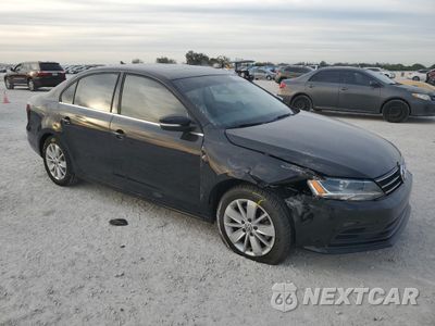Czwarte zdjęcie samochodu z boku: 2016 VOLKSWAGEN JETTA SE VIN:3VWD67AJXGM322133 - miniatura