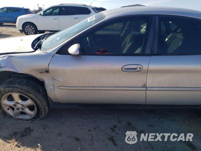 Zdjęcie 7 z 12 samochodu: 2000 FORD TAURUS SE VIN:1FAFP5327YG202472 - miniatura