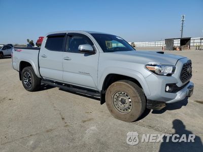 Czwarte zdjęcie samochodu z boku: 2020 TOYOTA TACOMA DOUBLE CAB VIN:3TMCZ5AN1LM331097 - miniatura