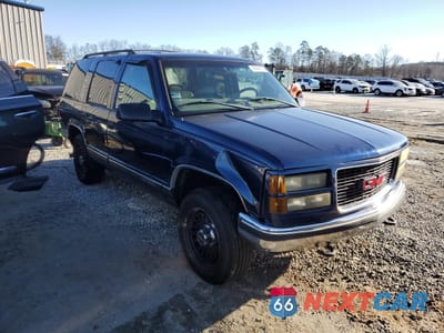 Czwarte zdjęcie samochodu z boku: 1998 GMC YUKON VIN:1GKEK13R5WJ712124 - miniatura