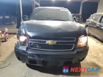 Piąte zdjęcie samochodu w środku: 2013 CHEVROLET SUBURBAN C1500 LT VIN:1GNSCJE09DR193546 - miniatura