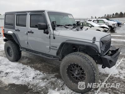 Czwarte zdjęcie samochodu z boku: 2014 JEEP WRANGLER UNLIMITED SPORT VIN:1C4BJWDG2EL308759 - miniatura
