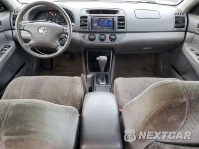 Zdjęcie 8 z 14 samochodu: 2004 TOYOTA CAMRY LE VIN:JTDBE32K340276270 - miniatura