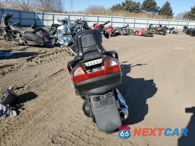 Czwarte zdjęcie samochodu z boku: 2006 SUZUKI AN400 K3 VIN:JS1CK43A262102328 - miniatura
