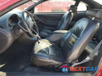 Zdjęcie 7 z 14 samochodu: 1999 FORD MUSTANG COBRA SVT VIN:1FAFP47V0XF216572 - miniatura