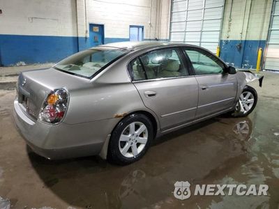 Trzecie zdjęcie samochodu z tyłu: 2002 NISSAN ALTIMA BASE VIN:1N4AL11E12C701097 - miniatura