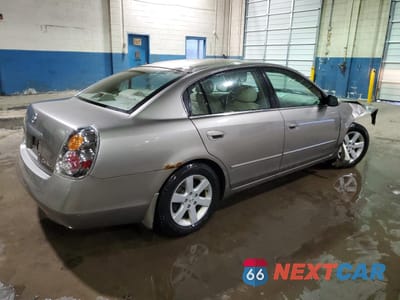 Trzecie zdjęcie samochodu z tyłu: 2002 NISSAN ALTIMA BASE VIN:1N4AL11E12C701097 - miniatura