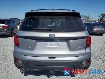 Zdjęcie 6 z 14 samochodu: 2023 HONDA PASSPORT EXL VIN:5FNYF8H54PB040111 - miniatura