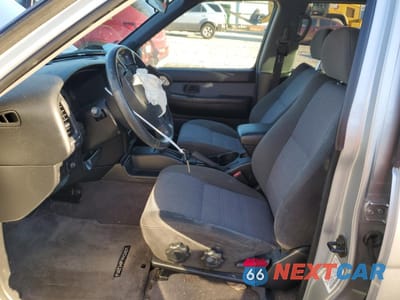 Zdjęcie 7 z 15 samochodu: 2003 NISSAN PATHFINDER LE VIN:JN8DR09X13W708447 - miniatura