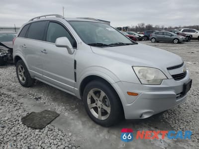 Czwarte zdjęcie samochodu z boku: 2013 CHEVROLET CAPTIVA LT VIN:3GNFL3EK1DS515074 - miniatura