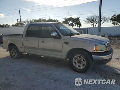 Czwarte zdjęcie samochodu z boku: 2002 FORD F150 SUPERCREW VIN:1FTRW07622KD25059 - miniatura