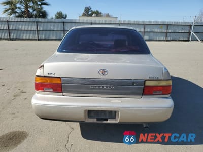 Zdjęcie 6 z 12 samochodu: 1995 TOYOTA COROLLA LE VIN:1NXAE09B2SZ329302 - miniatura