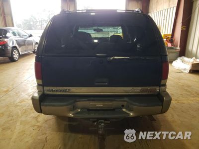 Zdjęcie 6 z 13 samochodu: 1999 GMC JIMMY VIN:1GKDT13WXX2539100 - miniatura