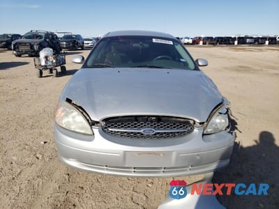 Piąte zdjęcie samochodu w środku: 2000 FORD TAURUS SE VIN:1FAFP5327YG202472 - miniatura