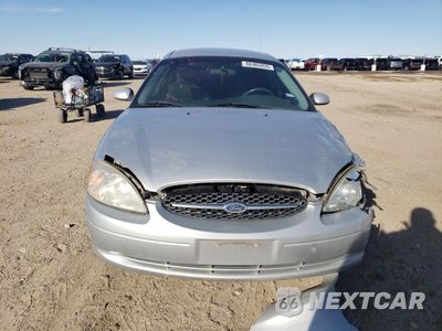 Piąte zdjęcie samochodu w środku: 2000 FORD TAURUS SE VIN:1FAFP5327YG202472 - miniatura