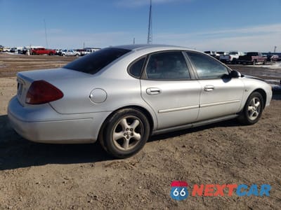 Trzecie zdjęcie samochodu z tyłu: 2000 FORD TAURUS SE VIN:1FAFP5327YG202472 - miniatura