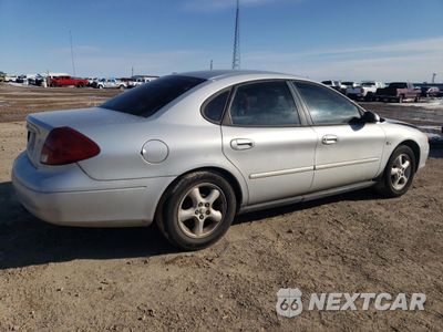 Trzecie zdjęcie samochodu z tyłu: 2000 FORD TAURUS SE VIN:1FAFP5327YG202472 - miniatura