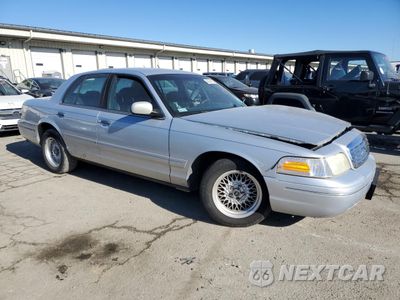 Czwarte zdjęcie samochodu z boku: 2002 FORD CROWN VICTORIA LX VIN:2FAFP74W72X147262 - miniatura