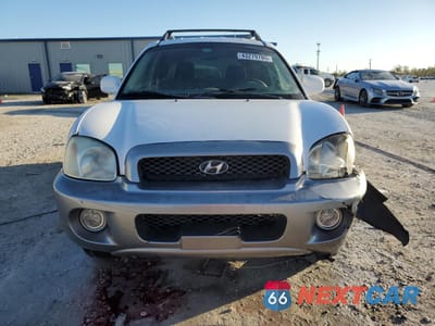 Piąte zdjęcie samochodu w środku: 2003 HYUNDAI SANTA FE GLS VIN:KM8SC13D73U508611 - miniatura