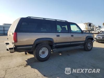 Trzecie zdjęcie samochodu z tyłu: 1996 CHEVROLET SUBURBAN K2500 VIN:3GNGK26J8TG145265 - miniatura