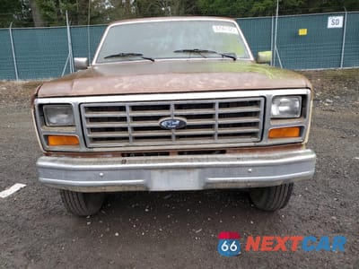 Piąte zdjęcie samochodu w środku: 1986 FORD F250 VIN:1FTHX25L0GKA40803 - miniatura