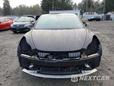 Piąte zdjęcie samochodu w środku: 2019 TESLA MODEL 3 VIN:5YJ3E1EB1KF385314 - miniatura