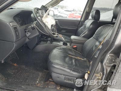 Zdjęcie 7 z 15 samochodu: 2002 JEEP GRAND CHEROKEE LAREDO VIN:1J4GW48N02C121322 - miniatura