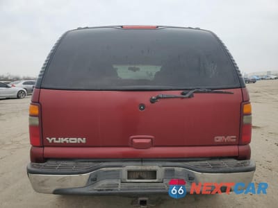 Zdjęcie 6 z 15 samochodu: 2002 GMC YUKON VIN:1GKEC13T02R245117 - miniatura