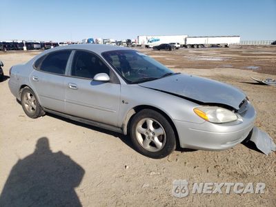 Czwarte zdjęcie samochodu z boku: 2000 FORD TAURUS SE VIN:1FAFP5327YG202472 - miniatura