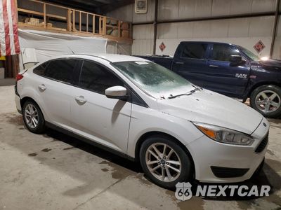 Czwarte zdjęcie samochodu z boku: 2018 FORD FOCUS SE VIN:1FADP3F21JL214699 - miniatura