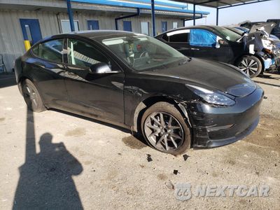 Czwarte zdjęcie samochodu z boku: 2023 TESLA MODEL 3 VIN:5YJ3E1EA3PF568552 - miniatura