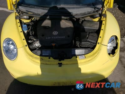 Zdjęcie 11 z 13 samochodu: 2000 VOLKSWAGEN NEW BEETLE GLS VIN:3VWCD21C4YM459396 - miniatura