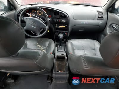 Zdjęcie 8 z 12 samochodu: 2003 KIA SPECTRA BASE VIN:KNAFB121335215523 - miniatura