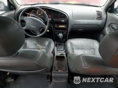 Zdjęcie 8 z 12 samochodu: 2003 KIA SPECTRA BASE VIN:KNAFB121335215523 - miniatura