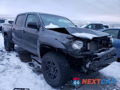 Czwarte zdjęcie samochodu z boku: 2014 TOYOTA TACOMA DOUBLE CAB VIN:3TMLU4EN3EM156728 - miniatura