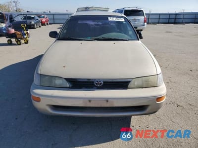 Piąte zdjęcie samochodu w środku: 1995 TOYOTA COROLLA LE VIN:1NXAE09B2SZ329302 - miniatura