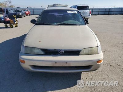Piąte zdjęcie samochodu w środku: 1995 TOYOTA COROLLA LE VIN:1NXAE09B2SZ329302 - miniatura