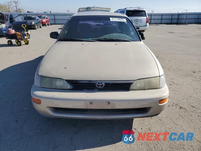 Piąte zdjęcie samochodu w środku: 1995 TOYOTA COROLLA LE VIN:1NXAE09B2SZ329302 - miniatura