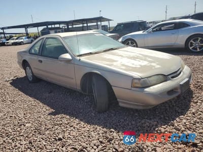 Czwarte zdjęcie samochodu z boku: 1994 FORD THUNDERBIRD LX VIN:1FALP6247RH172705 - miniatura
