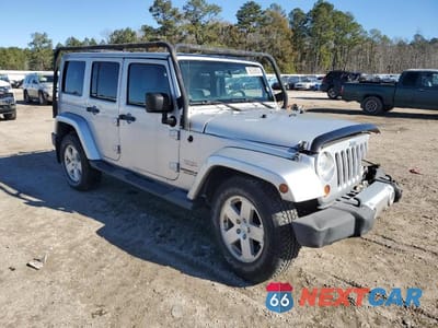 Czwarte zdjęcie samochodu z boku: 2012 JEEP WRANGLER UNLIMITED SAHARA VIN:1C4BJWEG4CL119025 - miniatura