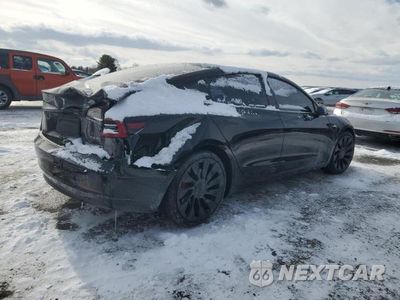 Trzecie zdjęcie samochodu z tyłu: 2022 TESLA MODEL 3 VIN:5YJ3E1ECXNF275276 - miniatura