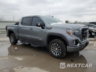 Czwarte zdjęcie samochodu z boku: 2021 GMC SIERRA K1500 AT4 VIN:3GTP9EEDXMG404390 - miniatura