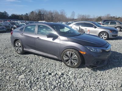 Czwarte zdjęcie samochodu z boku: 2016 HONDA CIVIC EX VIN:2HGFC1F4XGH637888 - miniatura