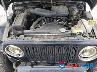 Zdjęcie 13 z 15 samochodu: 1999 JEEP WRANGLER / TJ SE VIN:1J4FY29PXXP482454 - miniatura