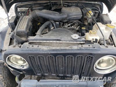Zdjęcie 13 z 15 samochodu: 1999 JEEP WRANGLER / TJ SE VIN:1J4FY29PXXP482454 - miniatura