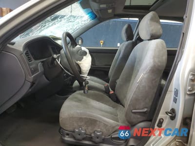 Zdjęcie 7 z 14 samochodu: 2002 HYUNDAI ELANTRA GLS VIN:KMHDN45D12U444923 - miniatura