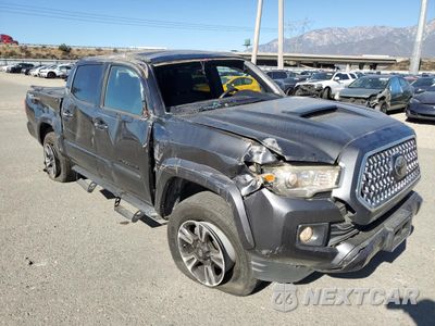 Czwarte zdjęcie samochodu z boku: 2019 TOYOTA TACOMA DOUBLE CAB VIN:3TMAZ5CN0KM086022 - miniatura